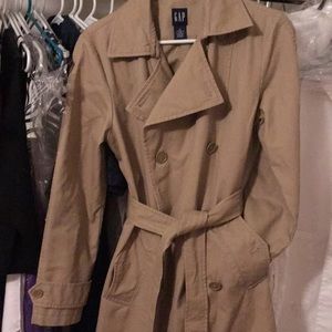 Classic double breasted tan trench coat